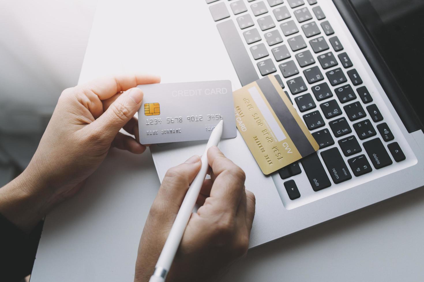 technology, people and online shopping concept - happy smiling man with tablet pc computer and credit card at home photo