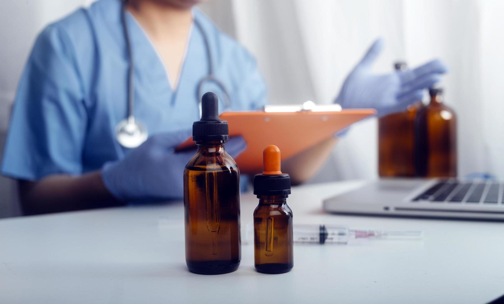 Medicine doctor hand working on a patients x-ray scans digital healthcare and connection with modern virtual screen interface icons, Medical technology and network concept. photo