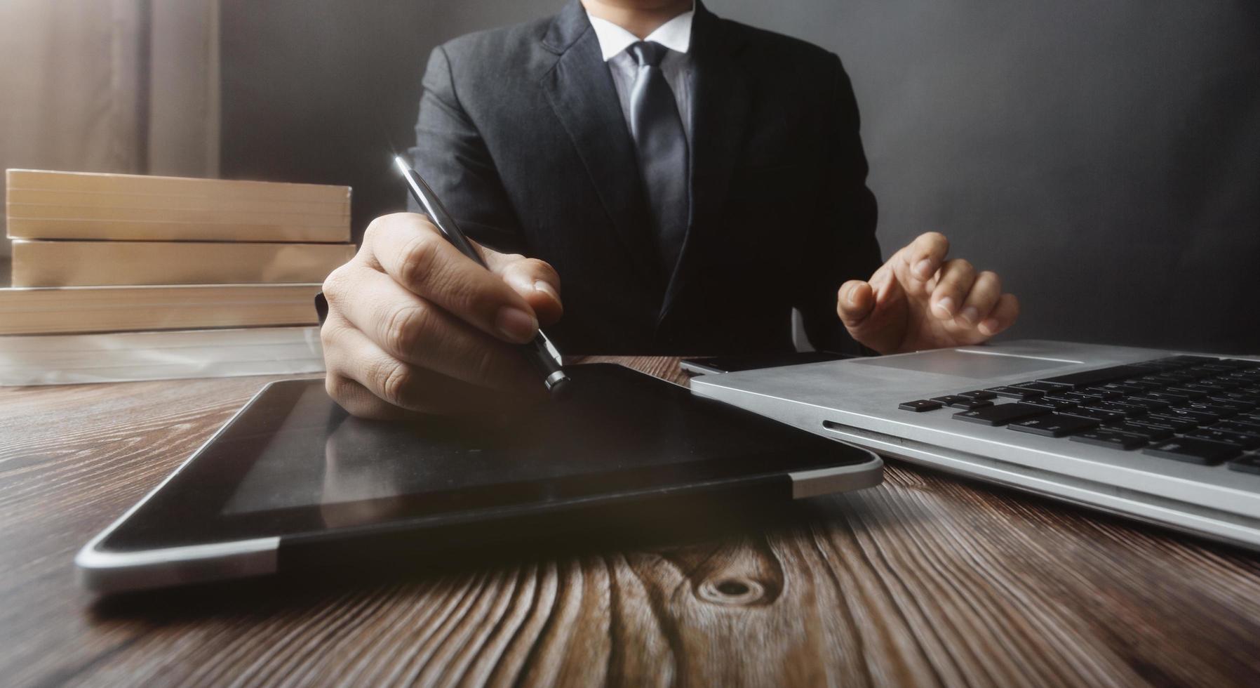 justice and law concept.Male judge in a courtroom on wooden table and Counselor or Male lawyer working in office. Legal law, advice and justice concept. photo