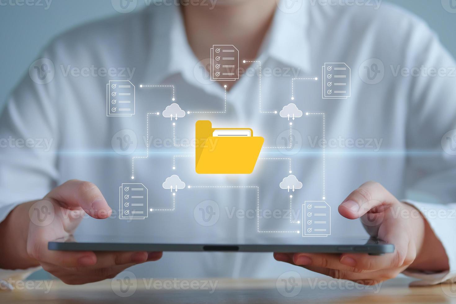 Document Management System - DMS , online documentation database and process to efficiently manage files. Cloud technology. Data storage. Hand hold tablet for searching folder and document from cloud. photo