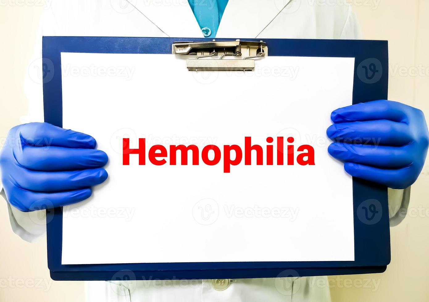 Medical term Hemophilia on clip board, health and medical conceptual image. photo