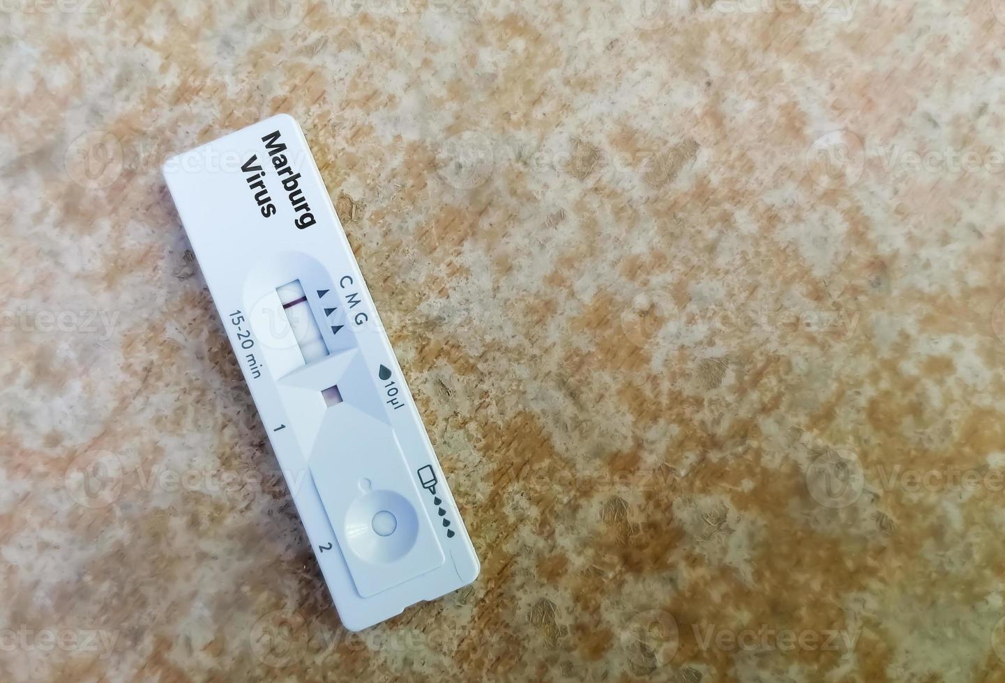 Marburg virus IgG positive result by using rapid test cassette photo