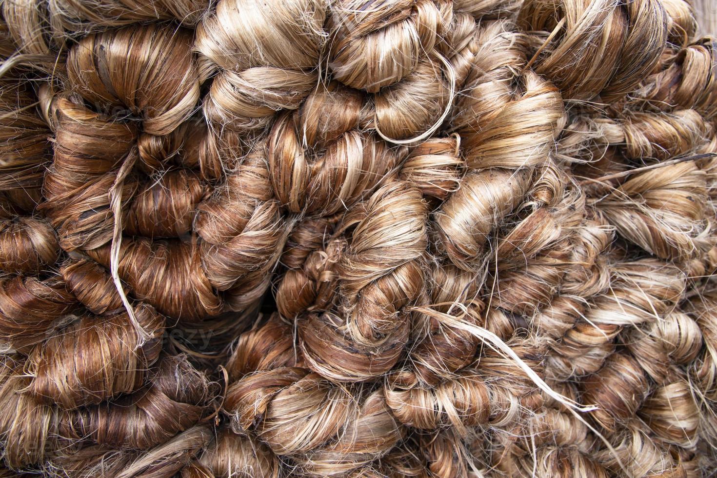 Thick Golden bundle of Wet raw jute fiber Texture Background 11107567