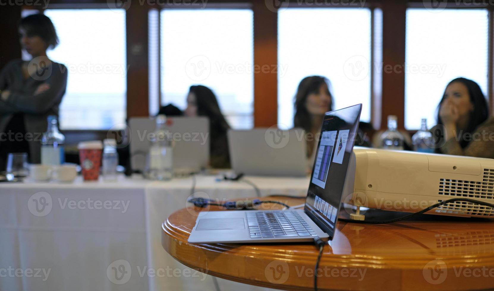 Selective focus on a laptop during a meeting photo