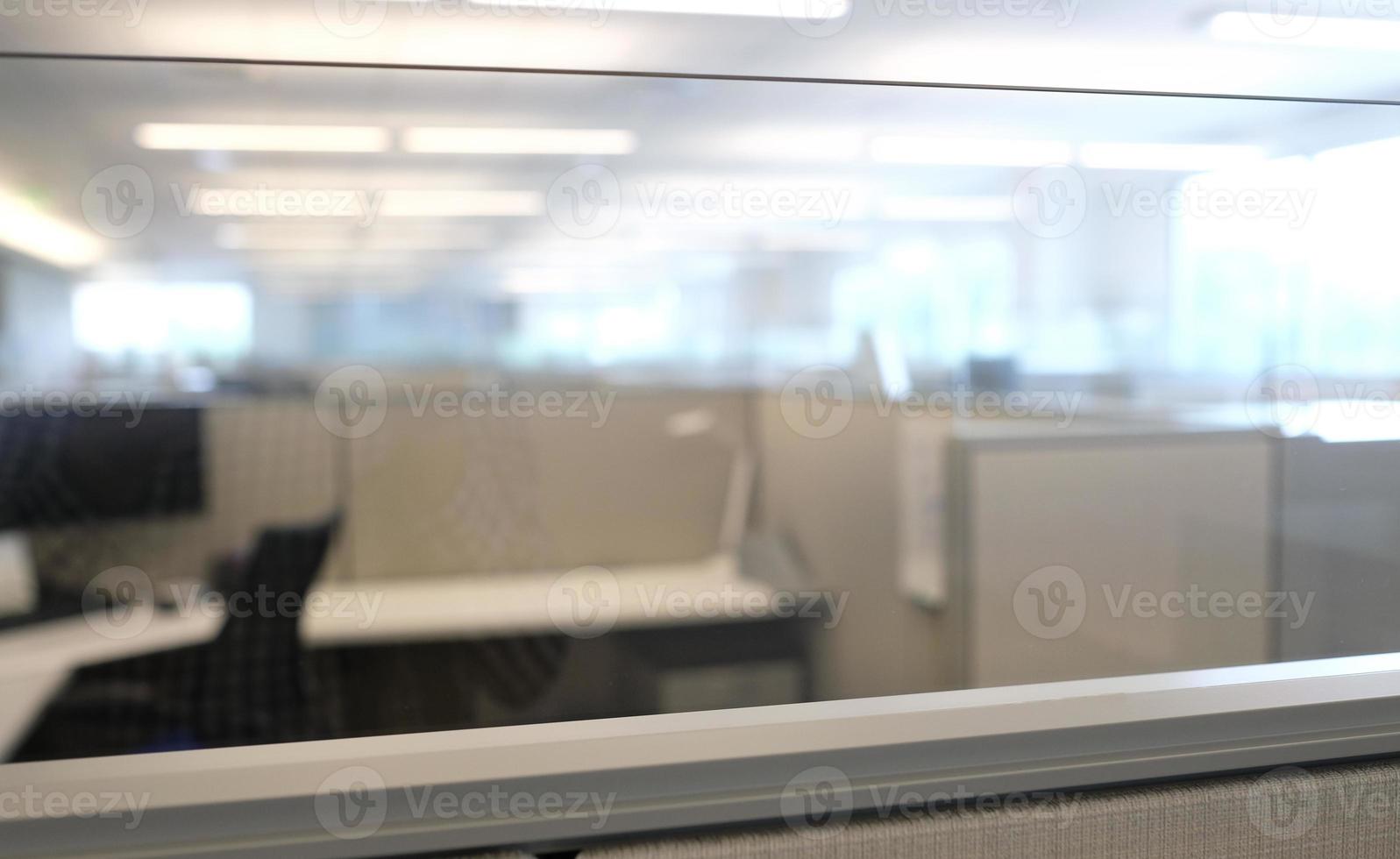 Selective focus in an empty office with cubicles photo