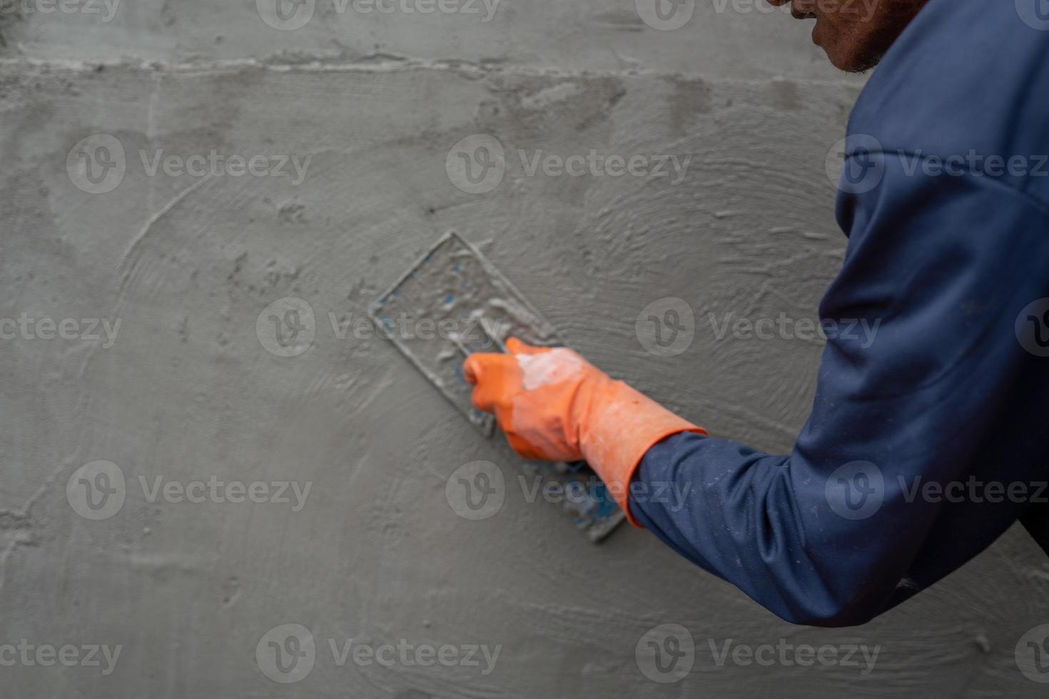 Cementitious trowel is used in the construction of buildings or rooms. photo