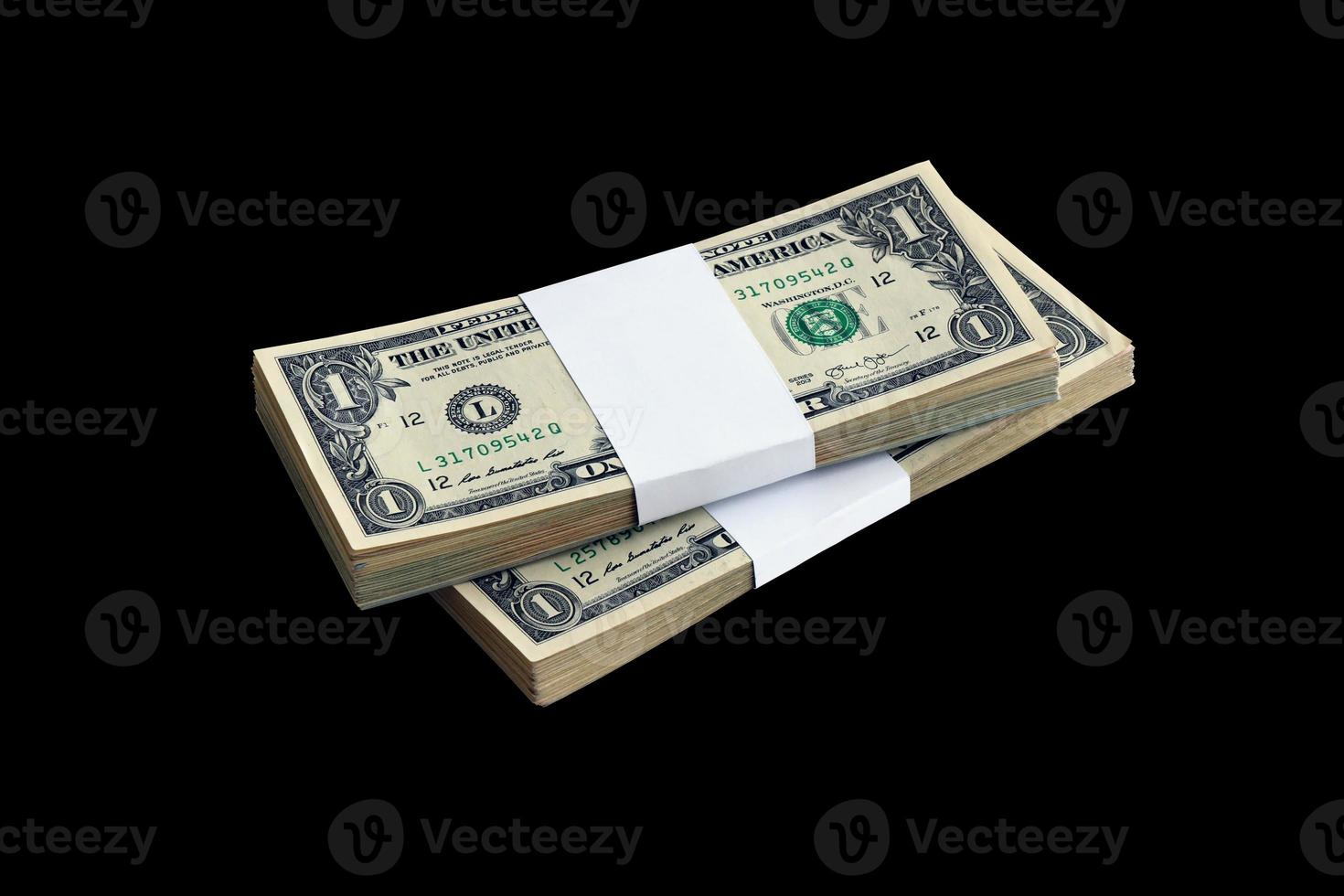 Bundle of US dollar bills isolated on black. Pack of american money with high resolution on perfect black background photo