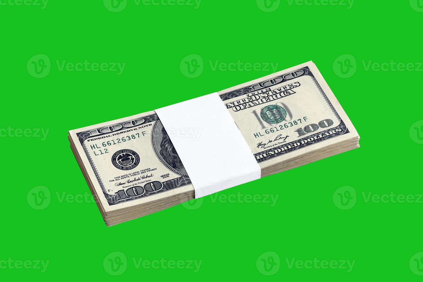 Bundle of US dollar bills isolated on chroma keyer green. Pack of american money with high resolution on perfect green mask photo