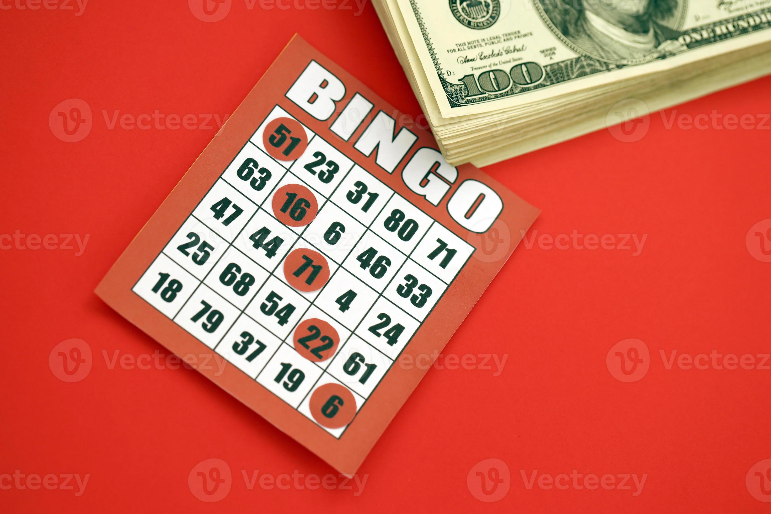 Red bingo board or playing card for winning chips and stack of dollar