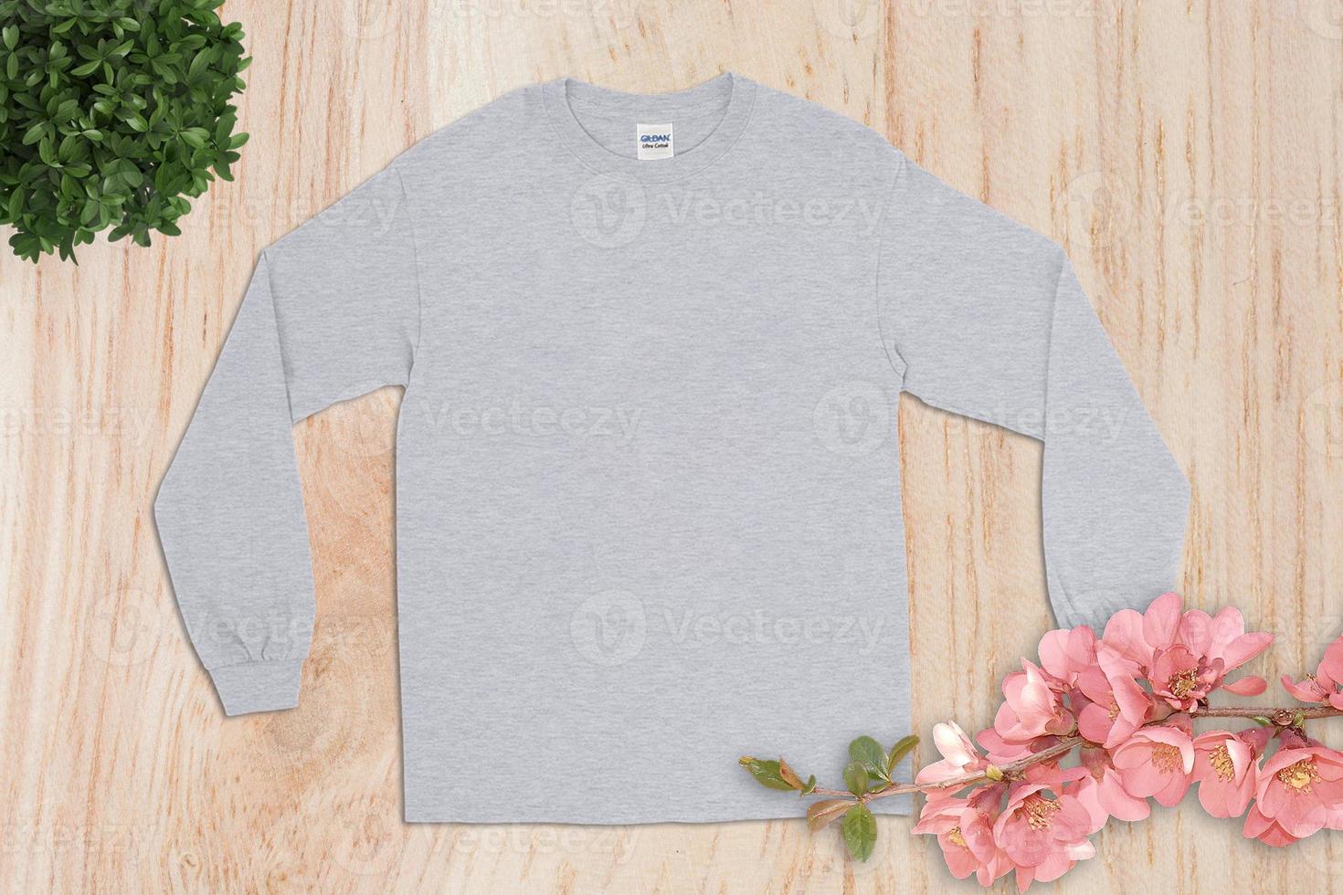 Blanks T-Shirt on Wood Background, Empty T-Shirt, T-Shirt Mockup photo