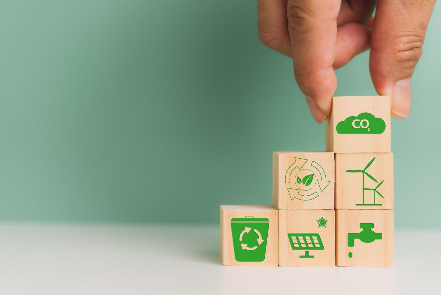 carbon credit net zero green technology eco industry strategy target business concept for environmental development. wood cube block icon on background. photo