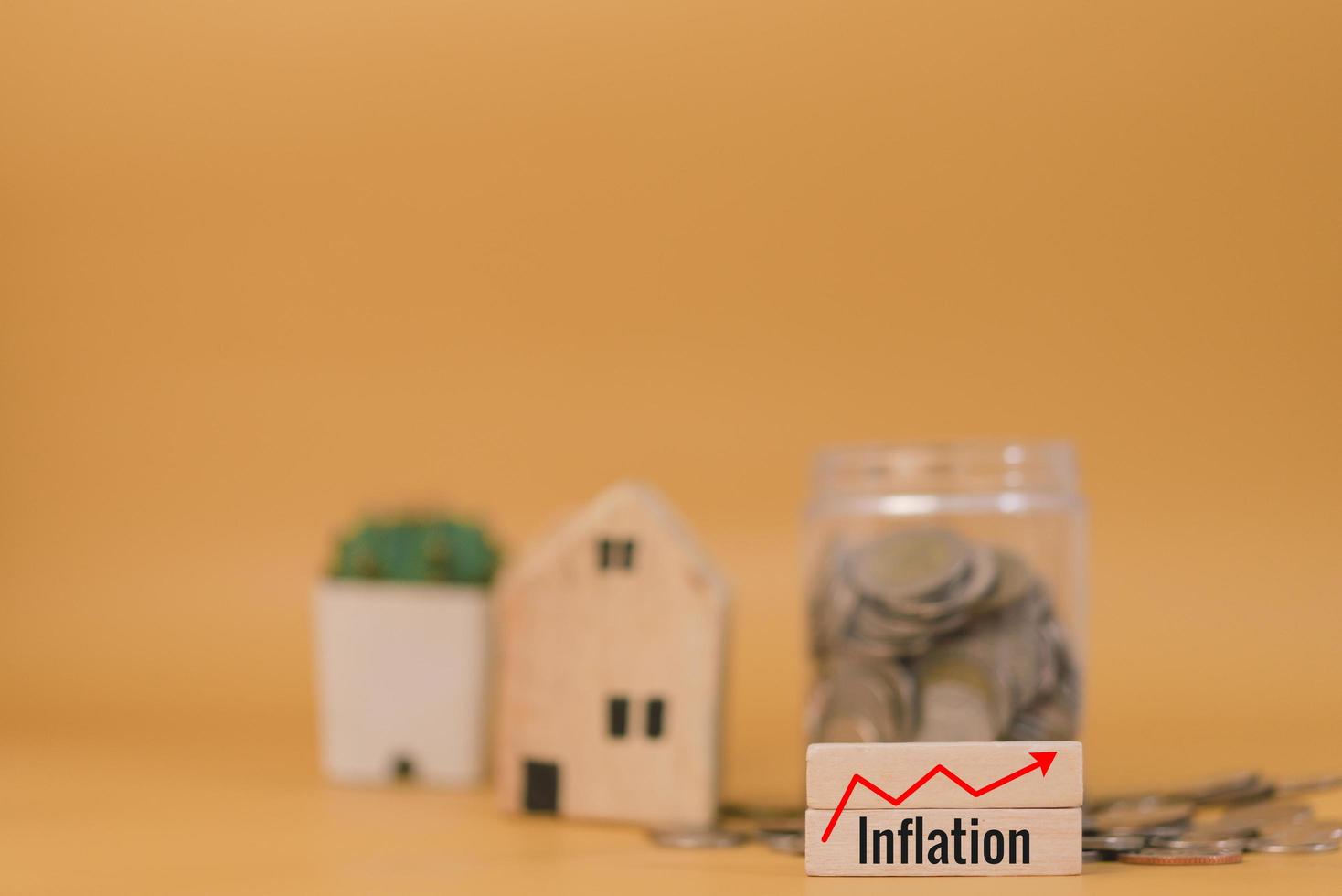 Saving money finance inflation investment economy and insurance home cash budget business concept yellow background. photo
