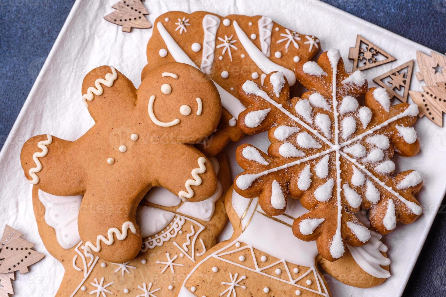 Christmas decorations and gingerbreads on a dark concrete table. Getting ready to celebration photo