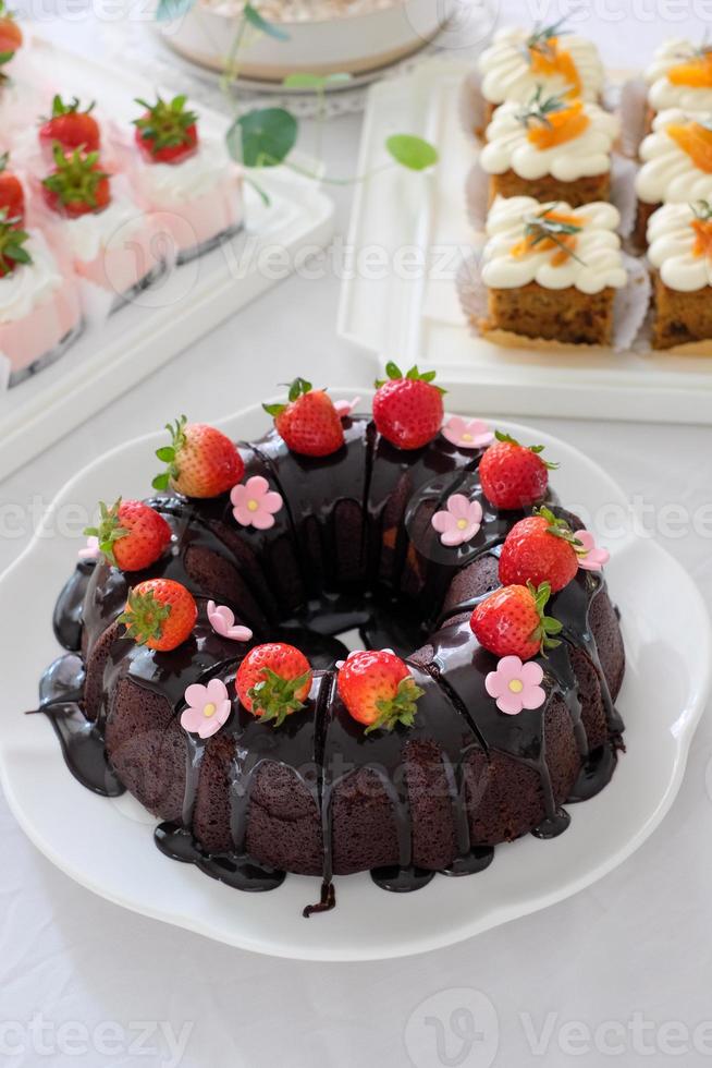 Chocolate cake with strawberry and cream cheese. Homemade bekery concept. photo