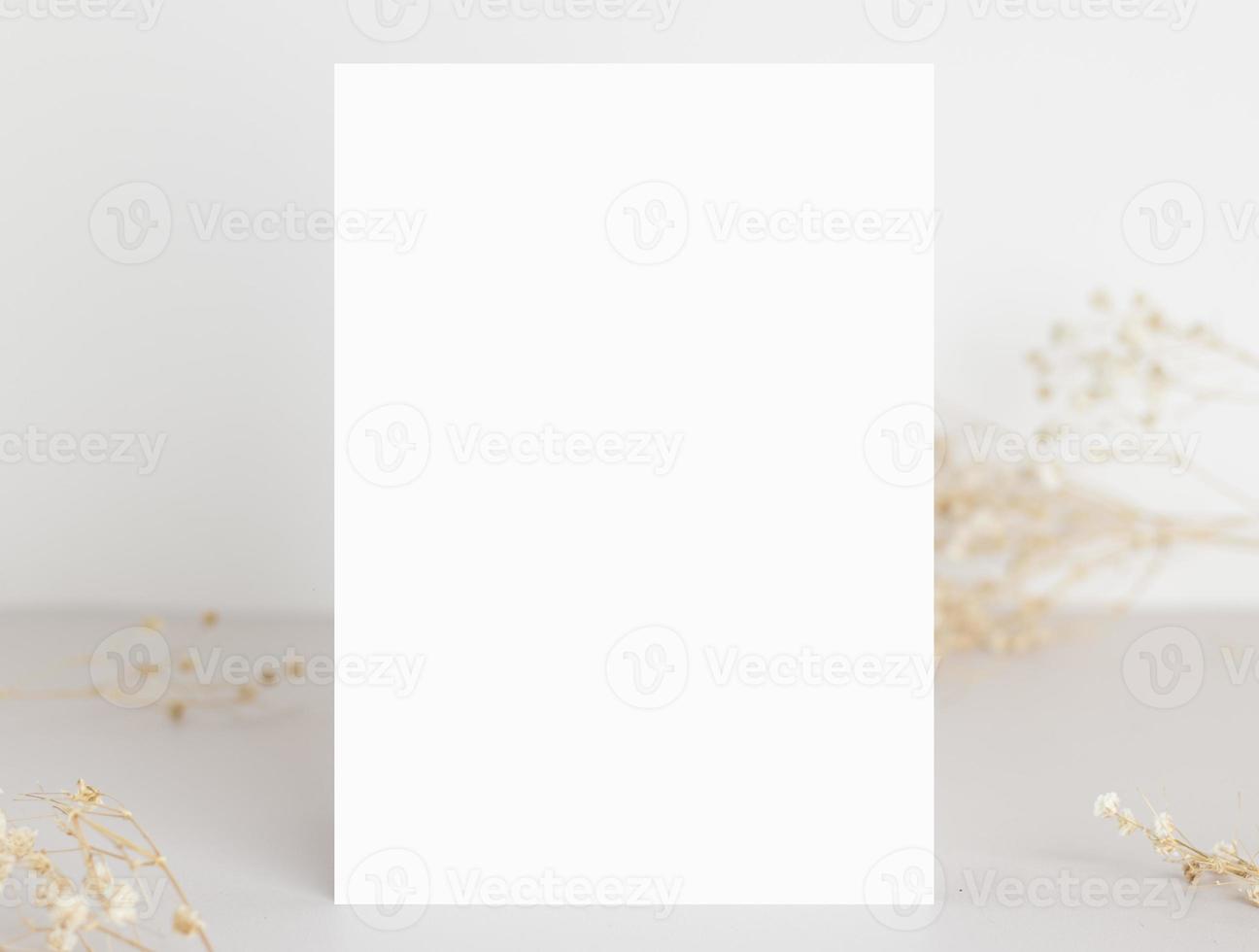 Greeting card mockup with dry leaves and branch  wedding cards  birthday card  Mockup for design photo