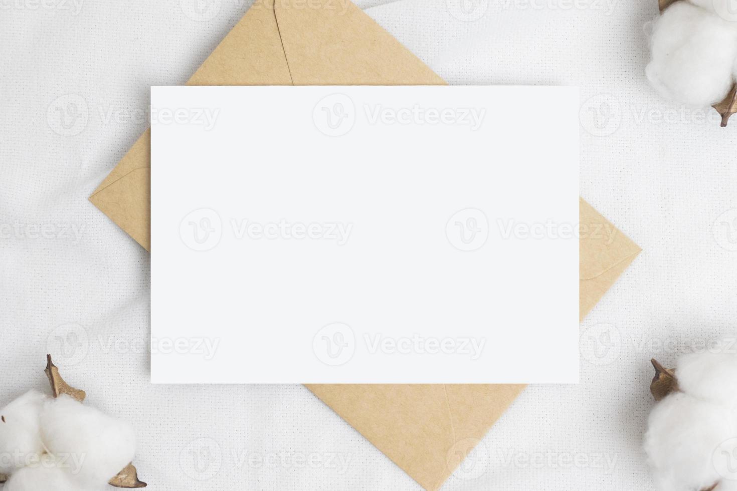 Greeting card mockup with Cotton flower and craft envelop, Wedding cards. Birthday card  Mockup for Template photo