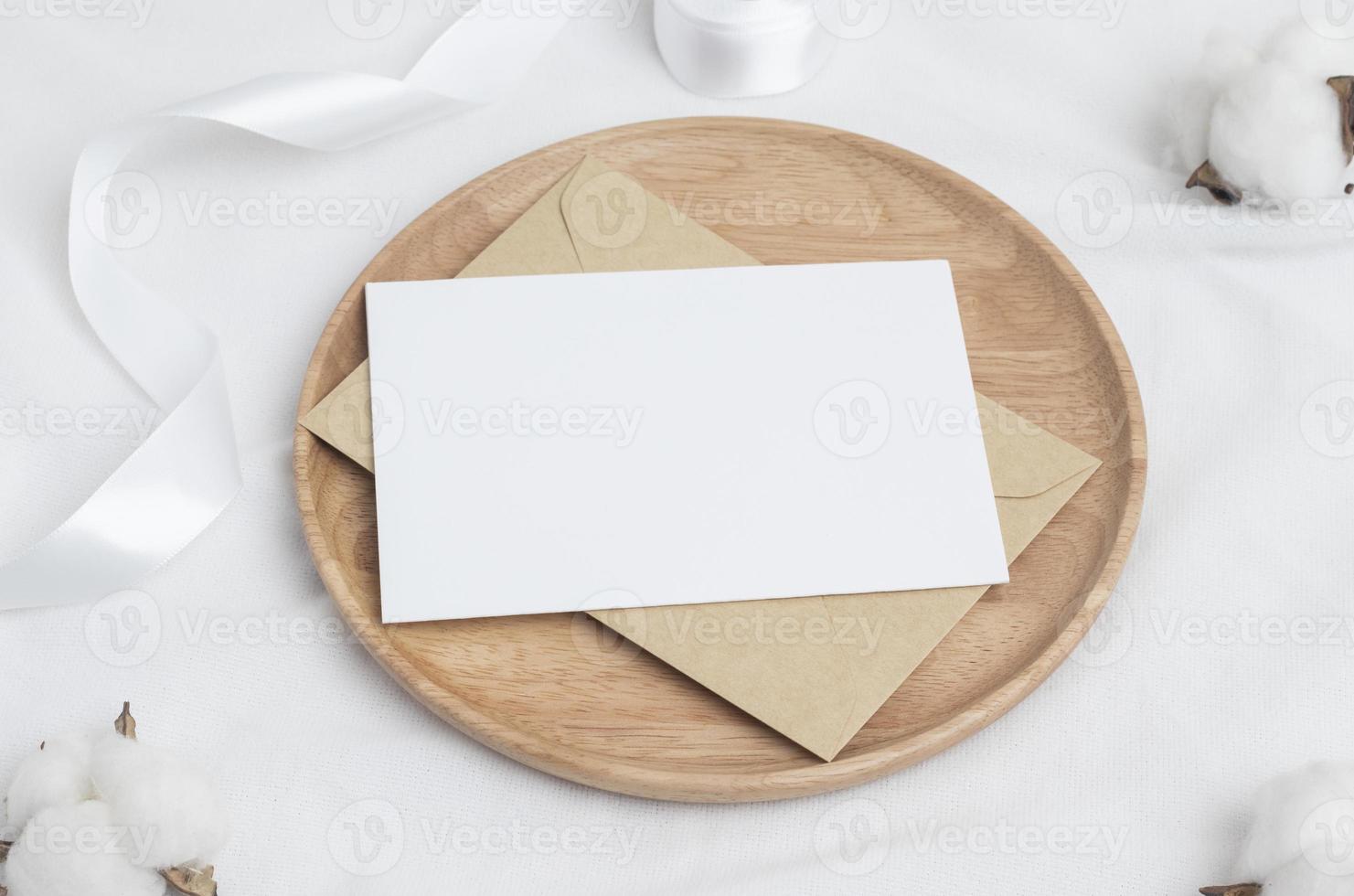 Greeting card mockup with Cotton flower and craft envelop, Wedding cards. Birthday card  Mockup for Template photo