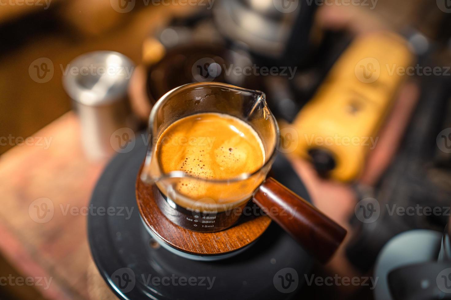 Expresso Coffee machine making a coffee photo