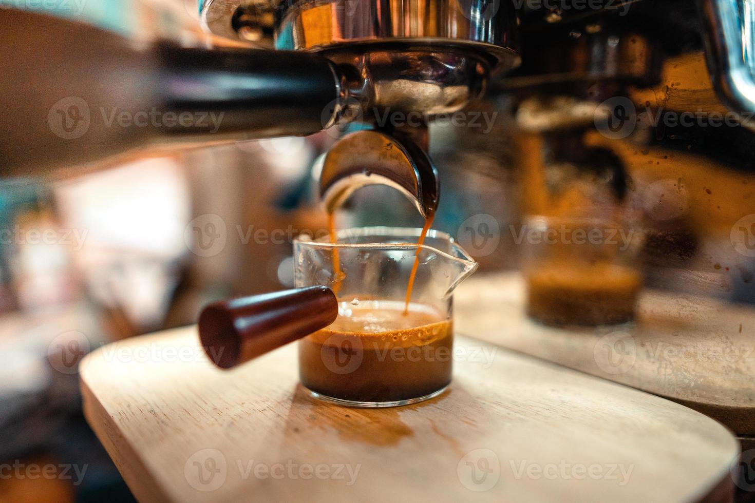 Expresso Coffee machine making a coffee photo
