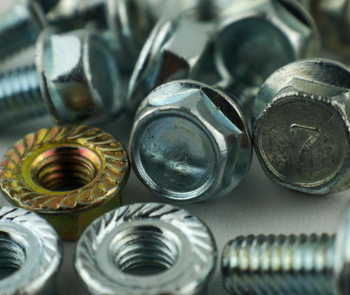 metal bolt, fasteners for repair close-up on a white background photo