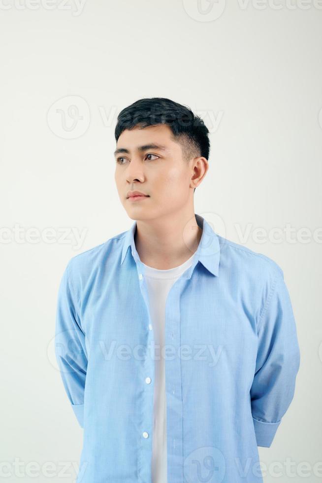 Stylish Asian guy leaning and looking at the side photo