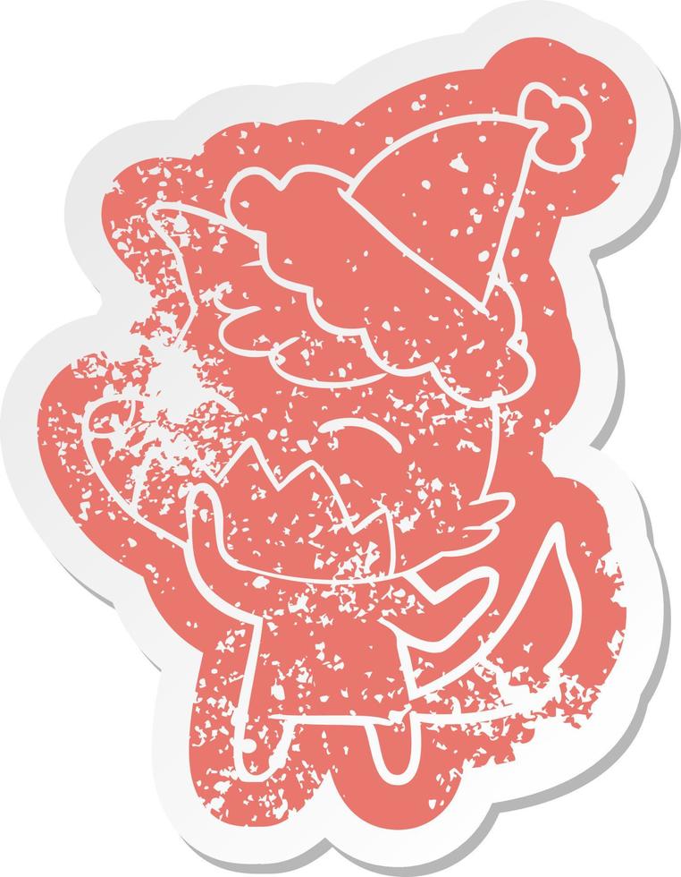 cartoon distressed sticker of a fox wearing santa hat vector