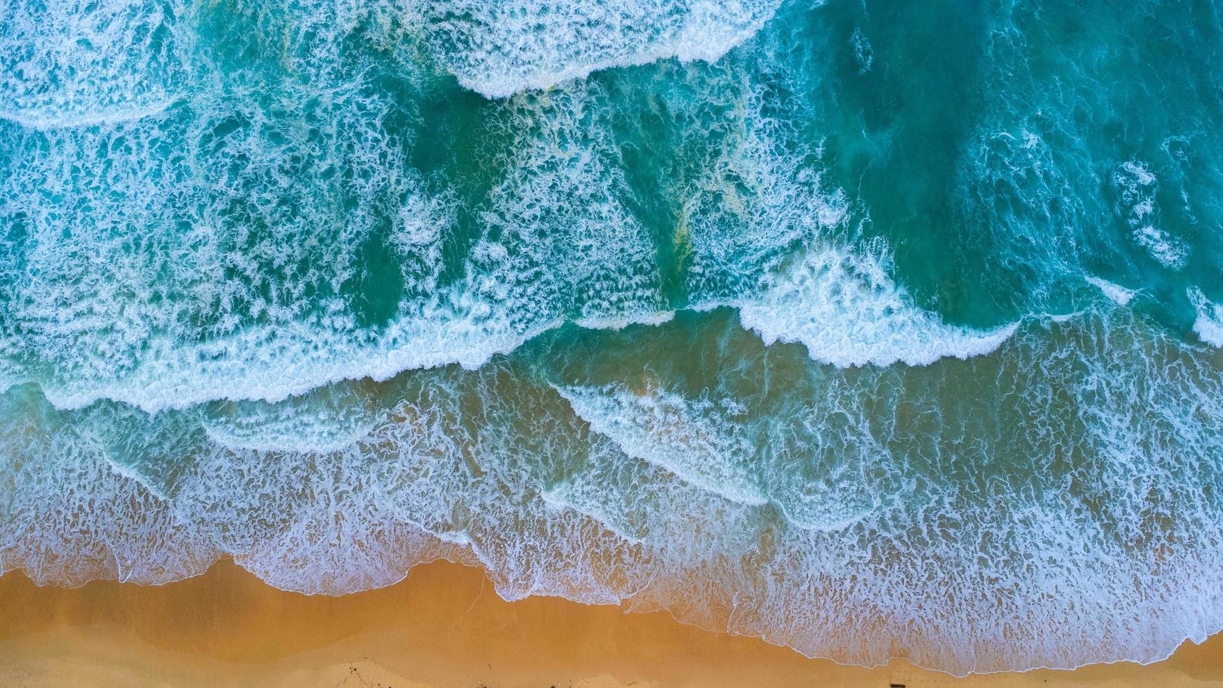 Beautiful sea waves and white sand beach in the tropical island ...
