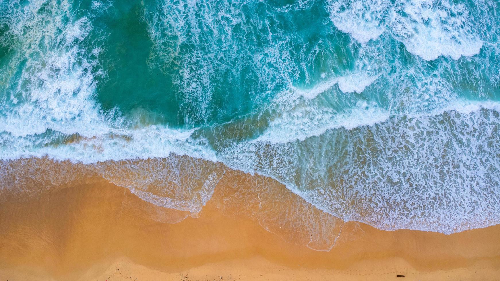 Beautiful sea waves and white sand beach in the tropical island ...