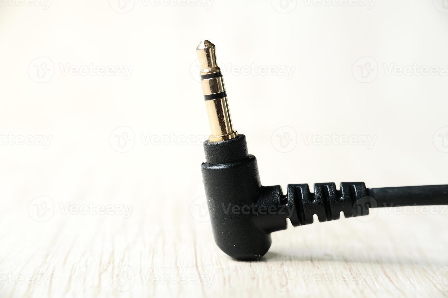 Jack audio cable 3.5mm on white background photo