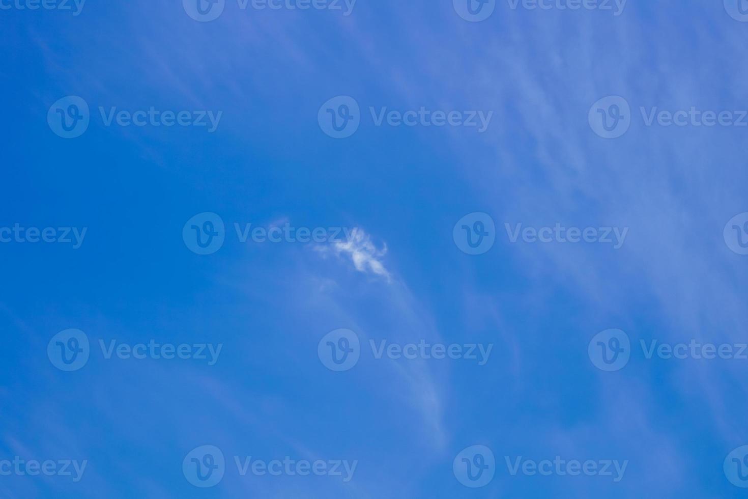 blue sky background with small clouds in panoramic view. photo