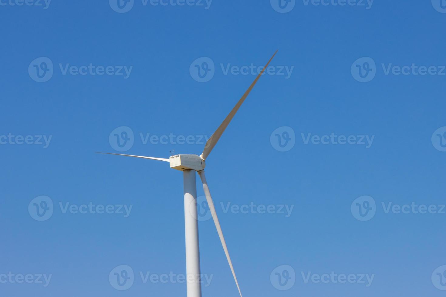 Wind farm, Wind farms. Wind power is the use of air flow through wind turbines to mechanically Power generators for electric power. photo