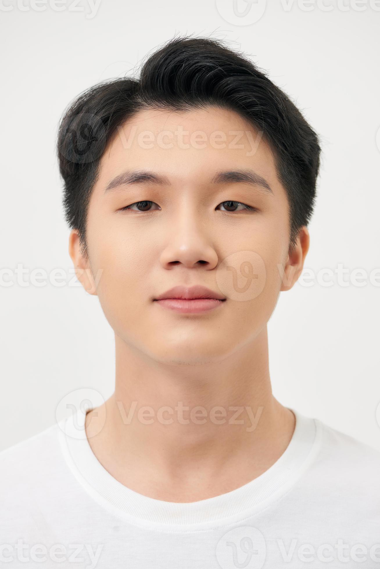 Happy smiling young handsome Asian man face on white background 11134701  Stock Photo at Vecteezy