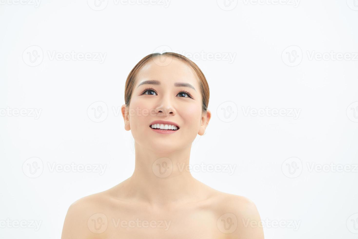 Happy beautiful Asian woman portrait on white background. photo
