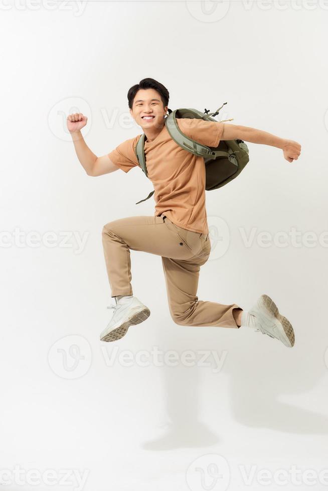 Full length body size photo of cheerful handsome guy  isolated over white background running towards his dream