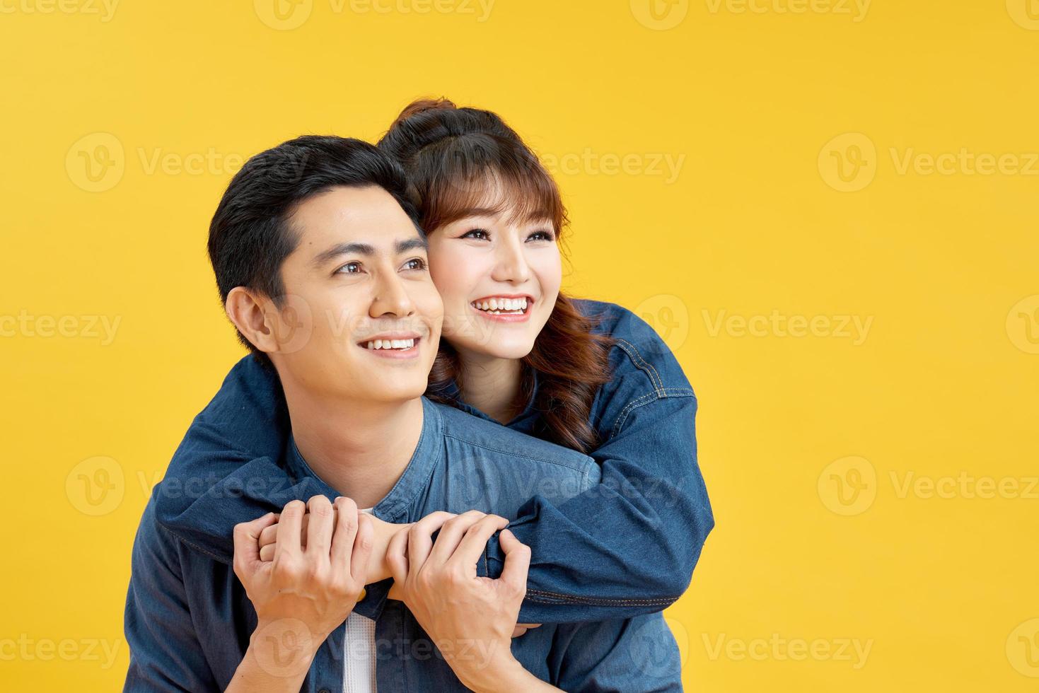 Pretty young woman embracing her boyfriend photo