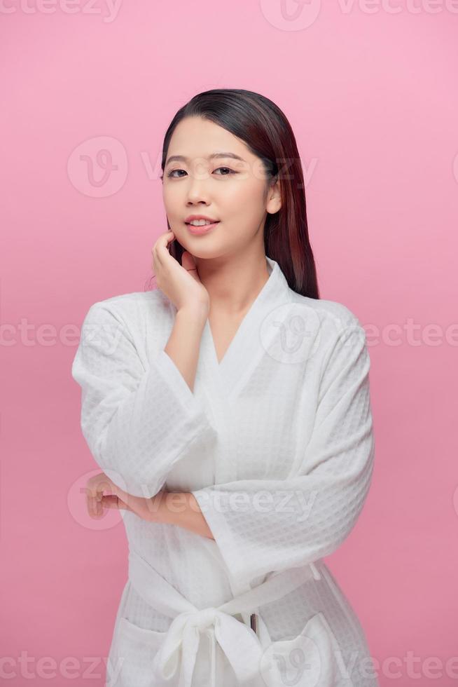 Beauty skin care woman touch her chin and smile photo