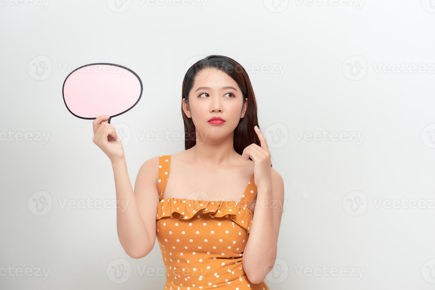 Funny Girl Holding Speech Bubble. Woman with empty announcement board photo