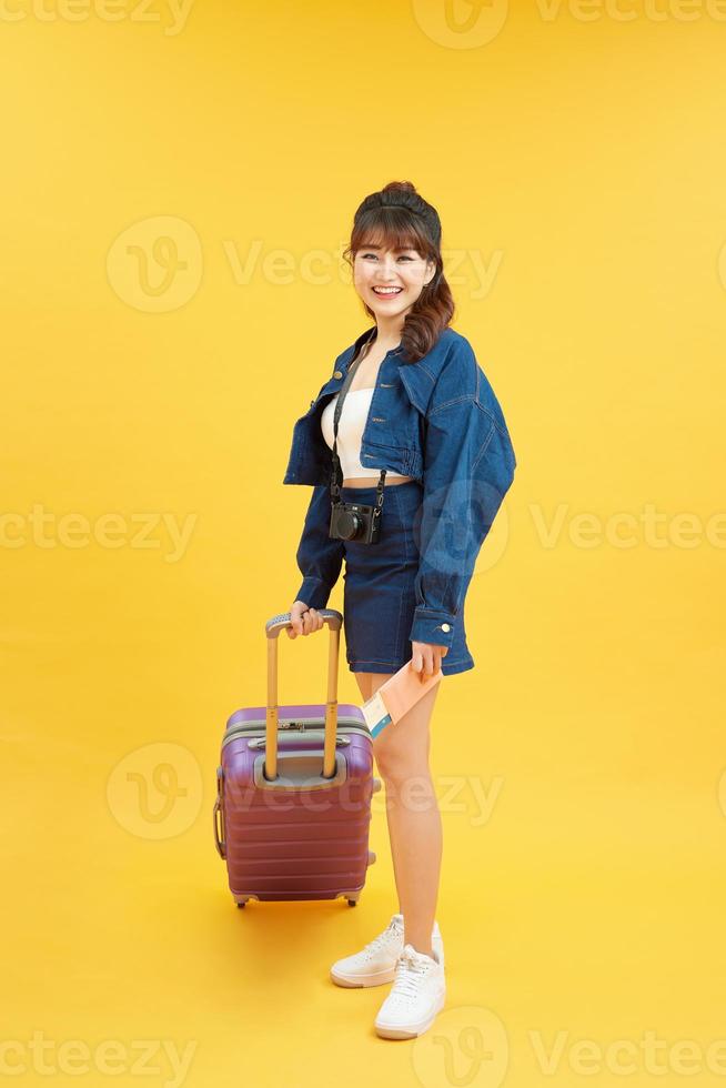 Asian woman going to summer vacation.Travel trip funny. photo