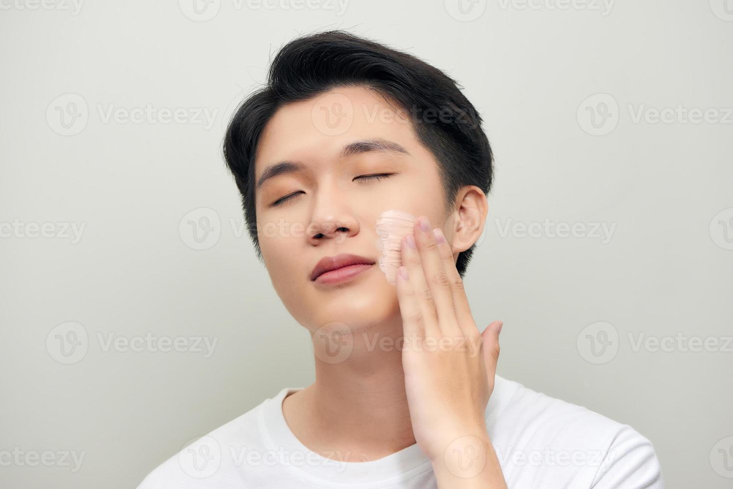relaxing man with a mud mask on this face 11137138 Stock Photo at Vecteezy