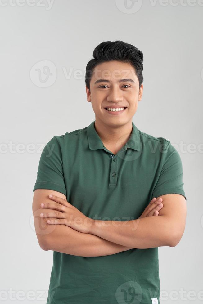 Confident man with his arms crossed photo