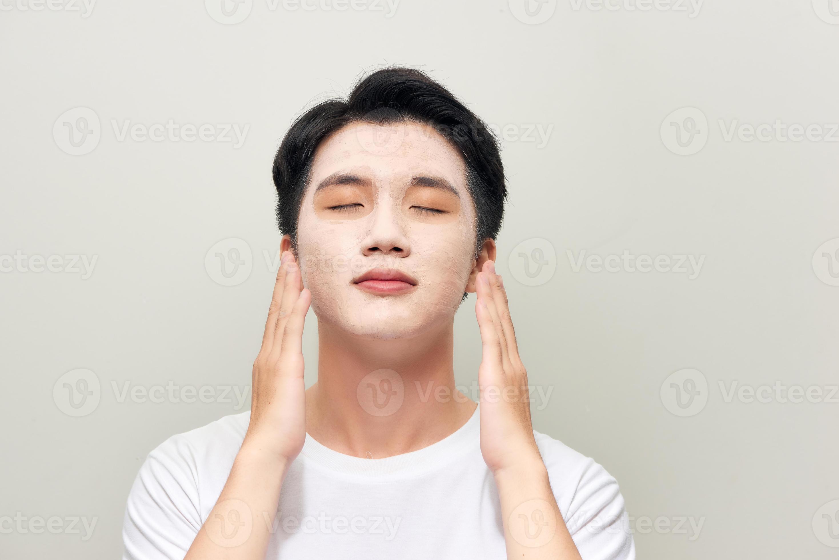 Male wearing clay face mask beauty treatment. 11137816 Stock Photo at