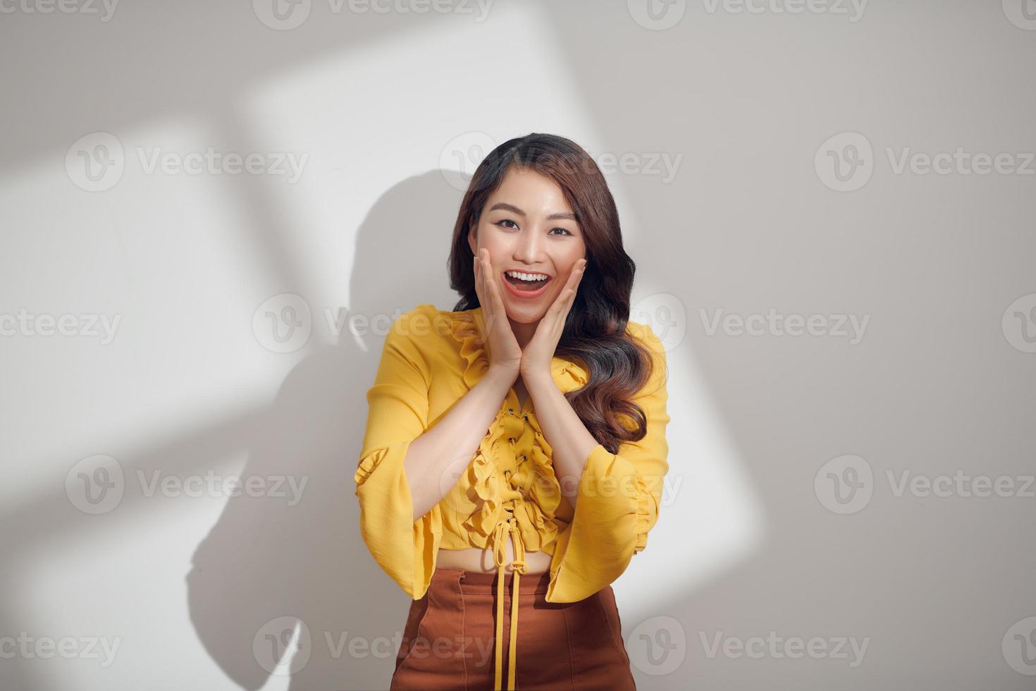 Beauty portrait of young Asian women on light and shadow background photo