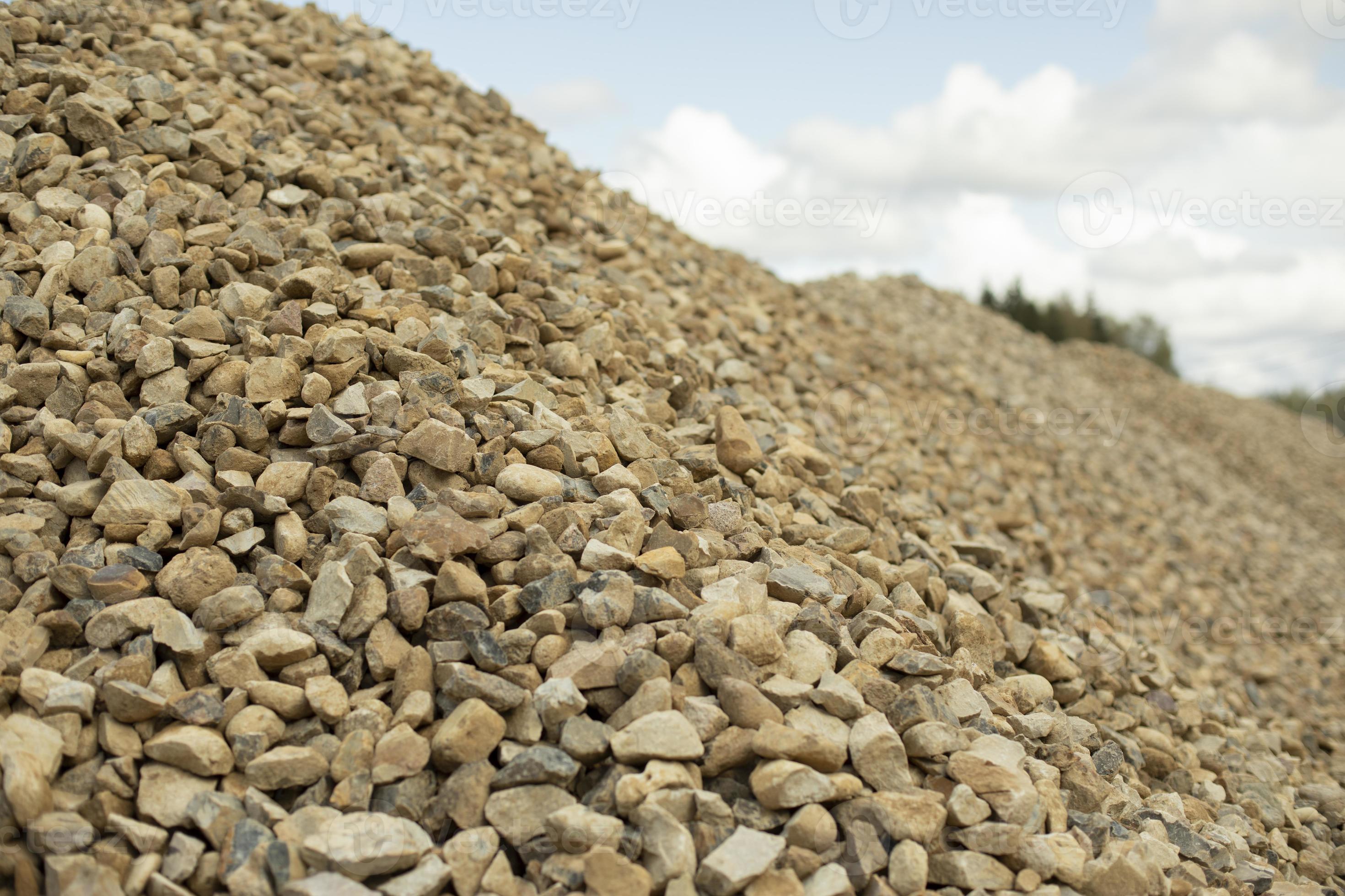 Crushed stone at construction site. Mound of stones. Building material