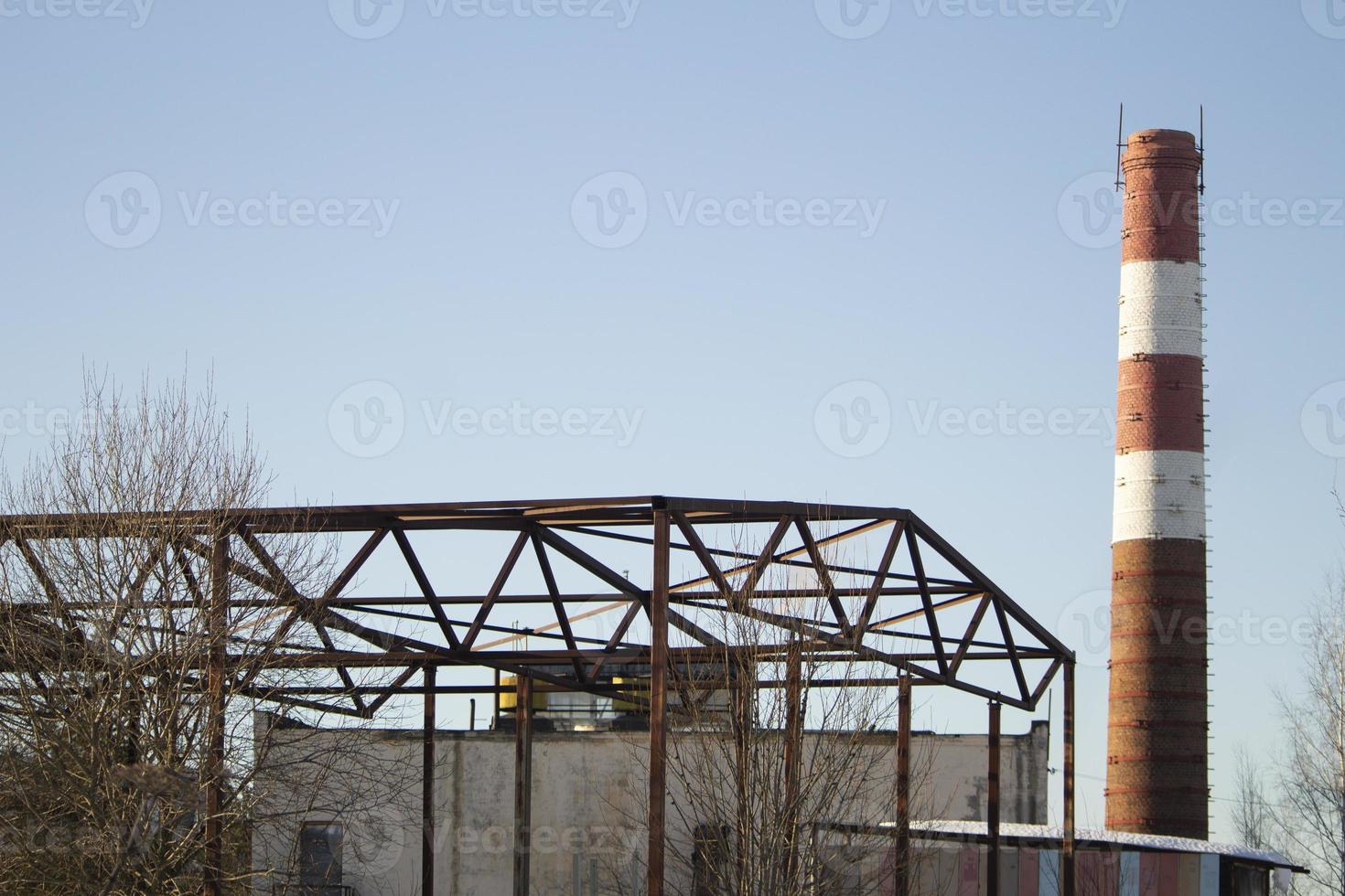 Pipe factory. Industrial area with pipe. Large steel structure. photo