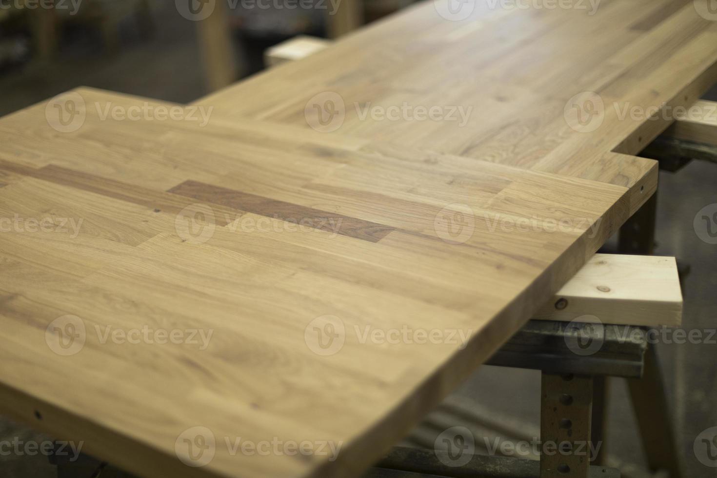 Manufacture of furniture in carpentry workshop. Board with beautiful texture. photo