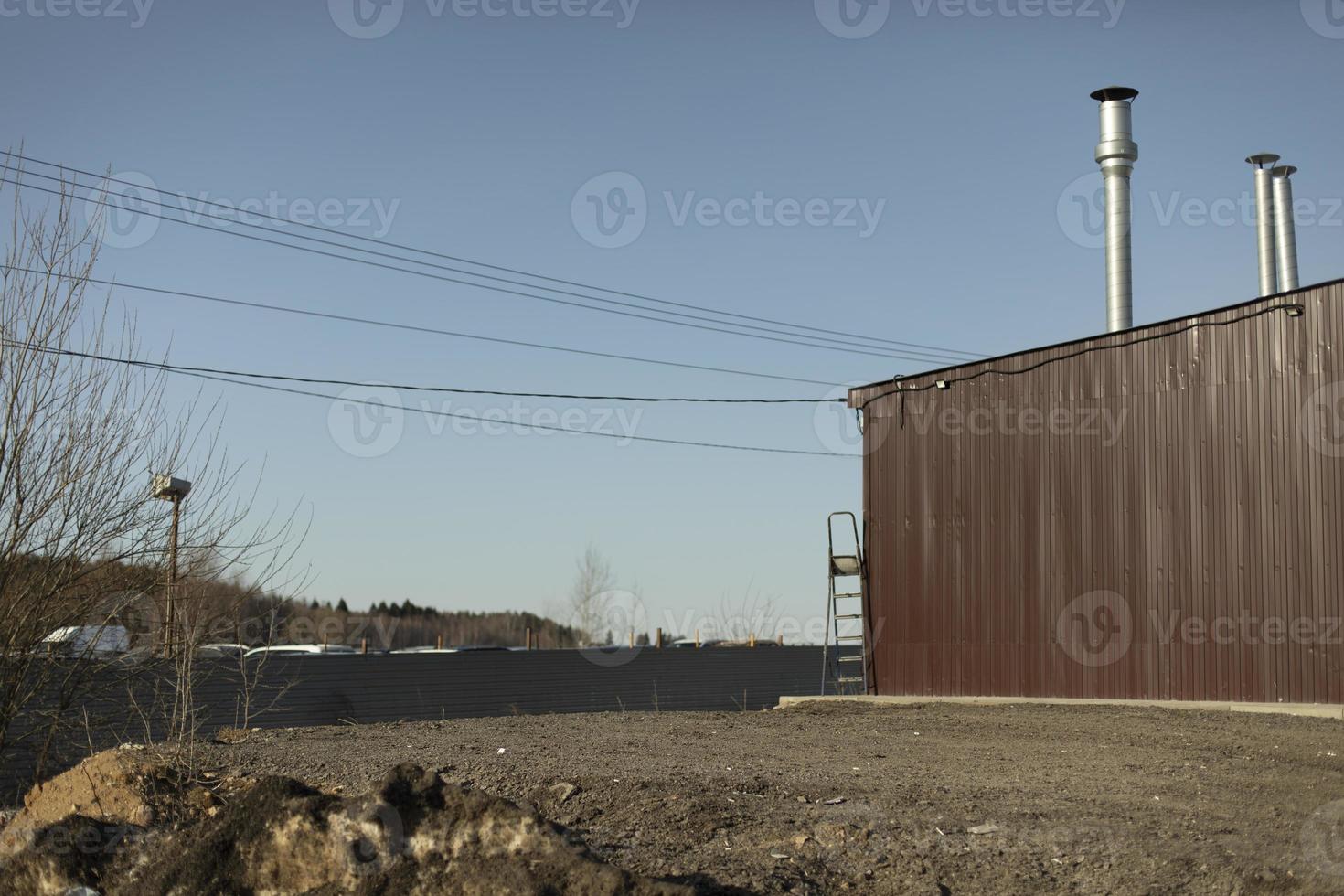 Old building in city. Industrial area. Details of industrial-looking architecture. photo