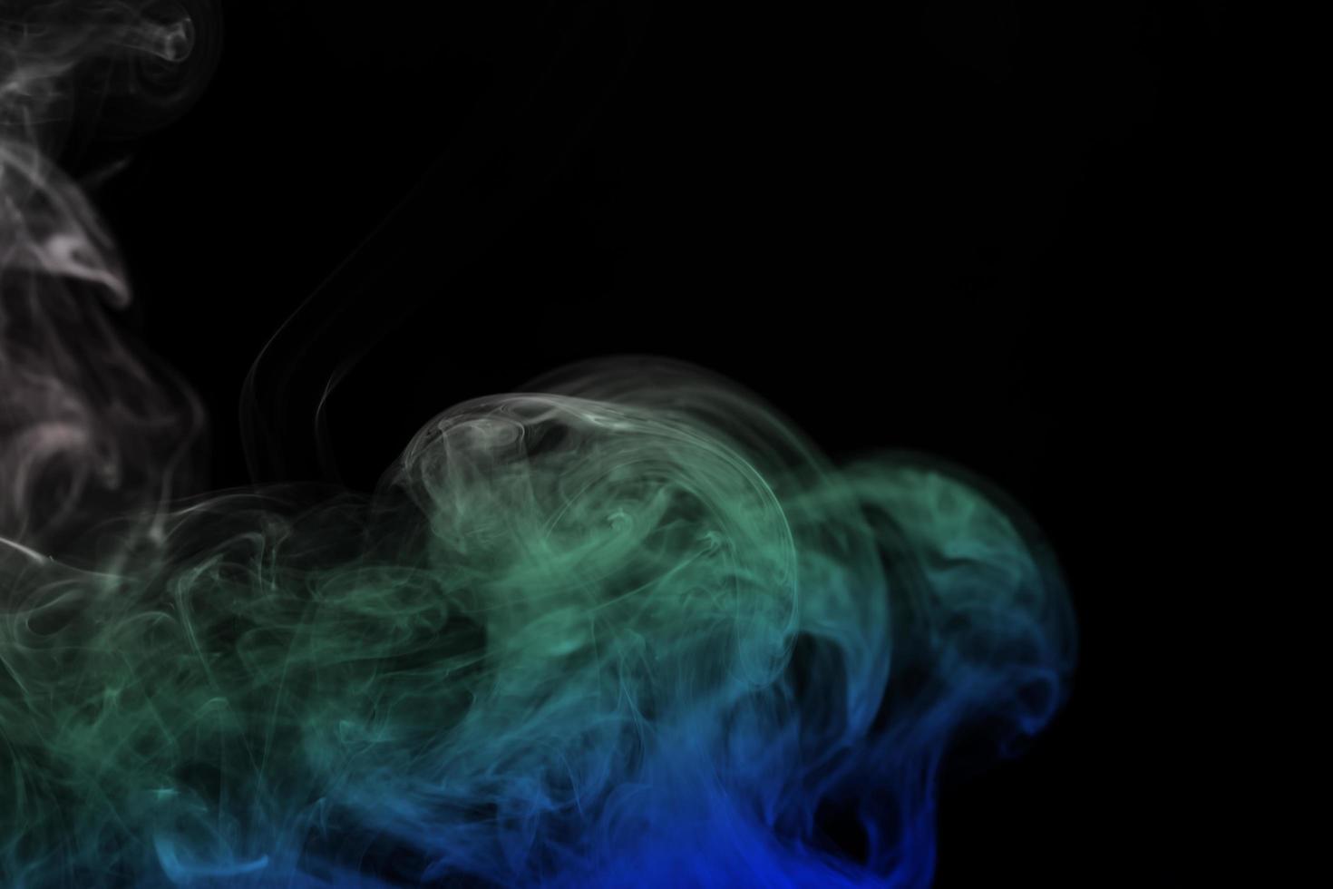 colored smoke isolated on white background photo