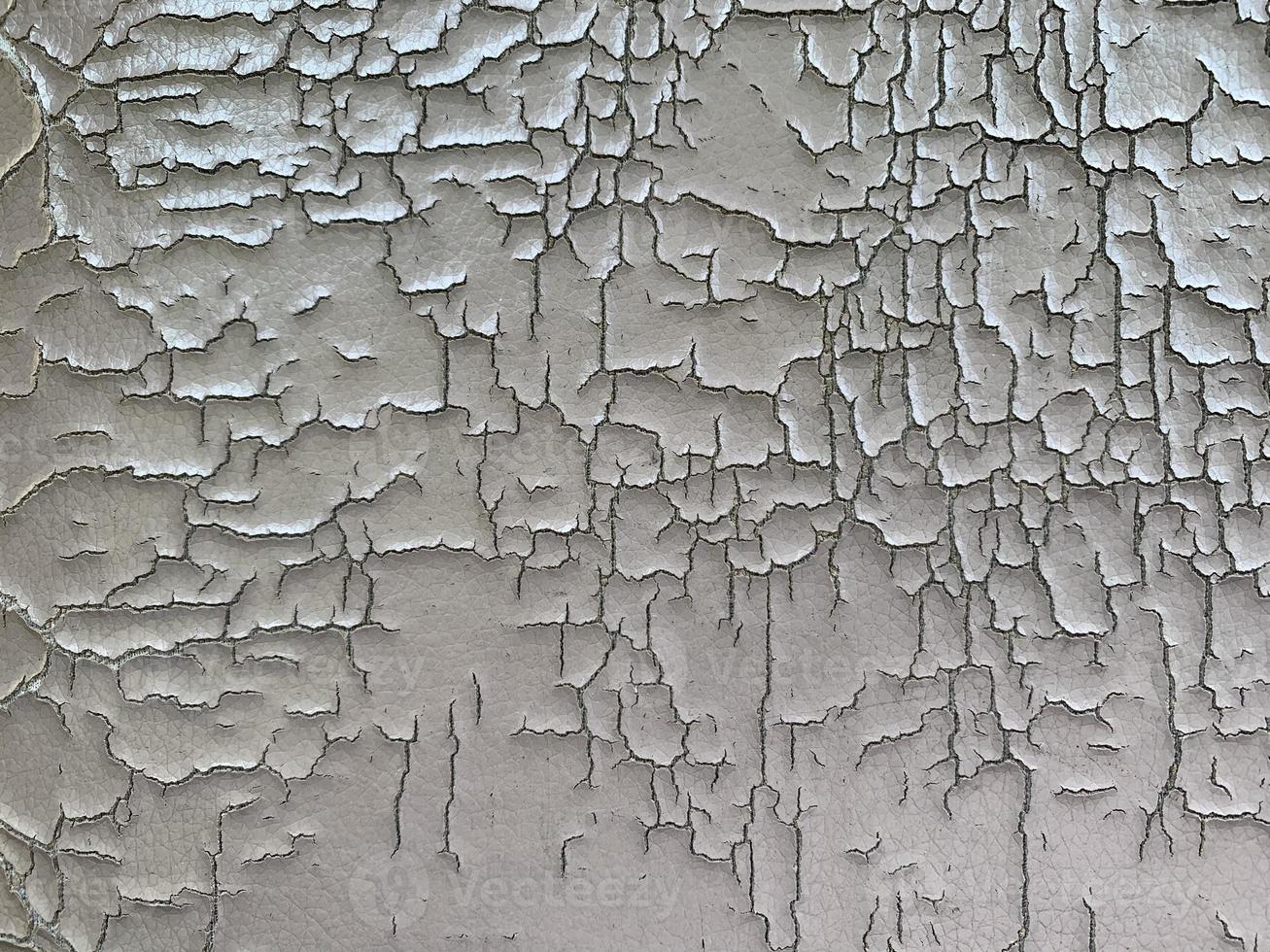 Texture of cracks of gray leather, Old gray leather background photo
