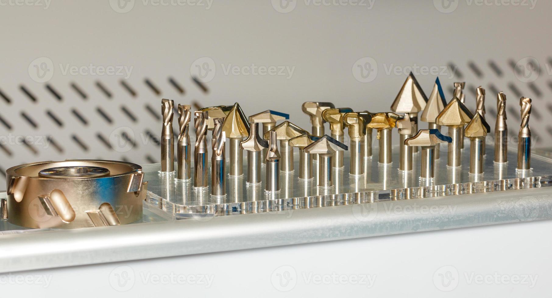Carbide cutters of various configurations for the woodworking industry. photo