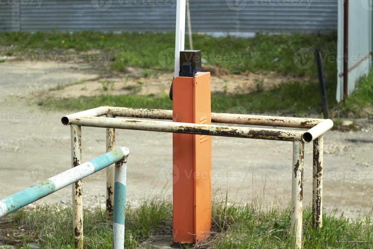 Barrier on street. Parking details. Parking barrier. photo